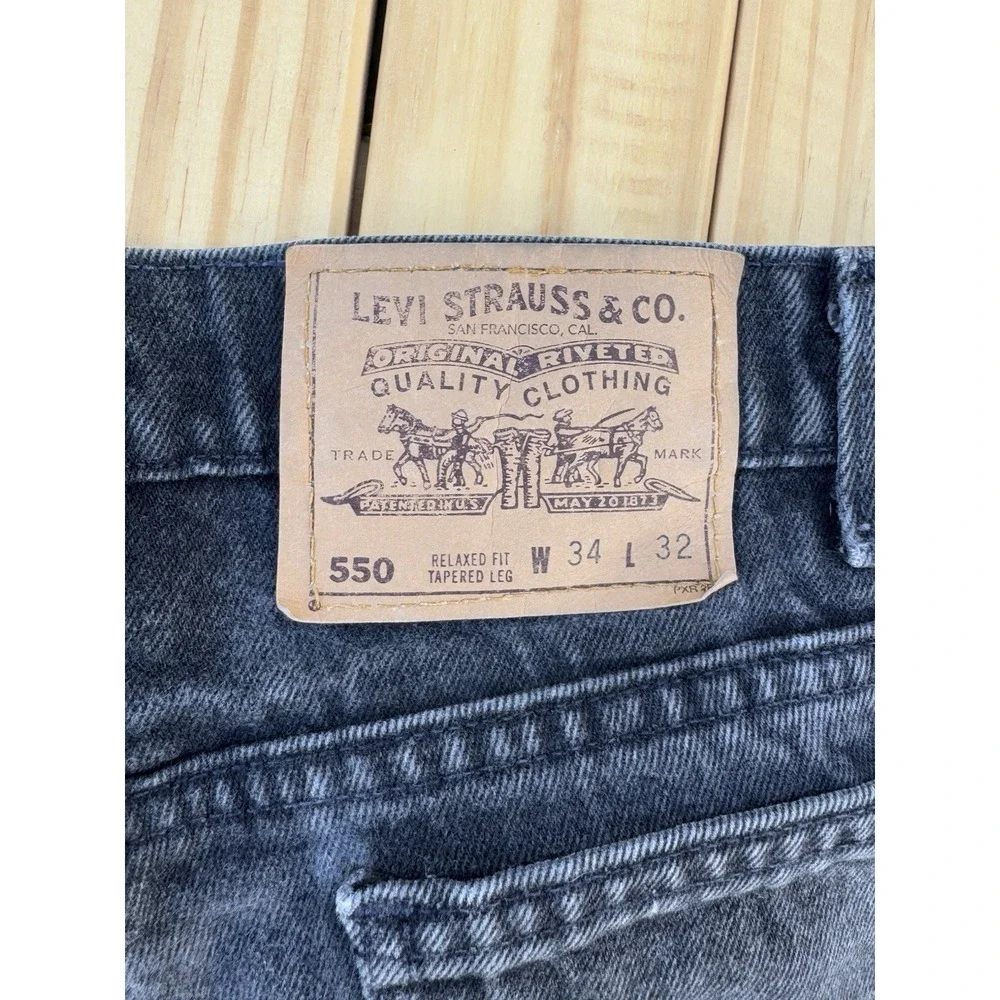 Vintage Black Levi's 550 Relaxed Fit Tapered Leg Orange Tab 34x32
